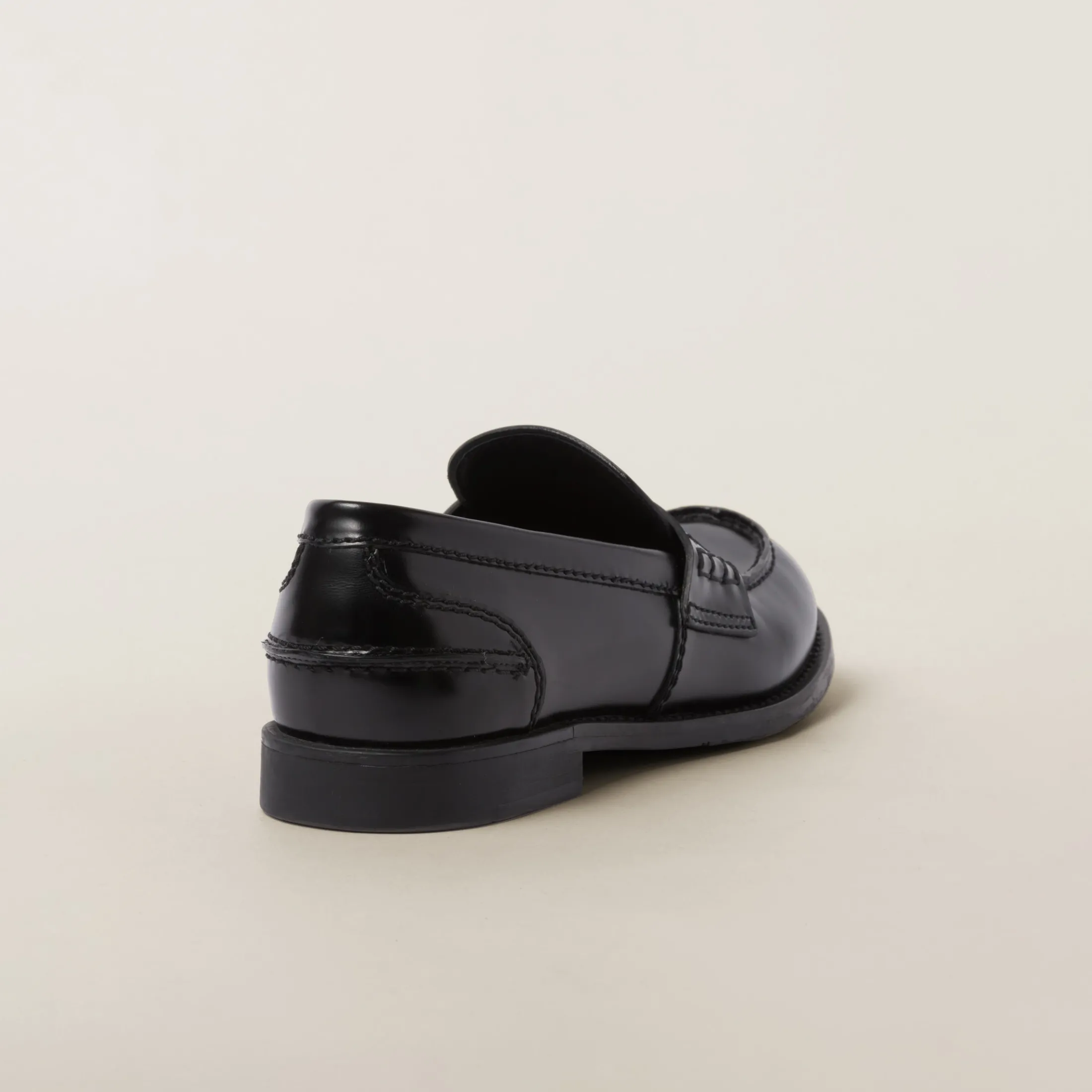 Black Brushed Leather Penny Loafers | Miu Miu