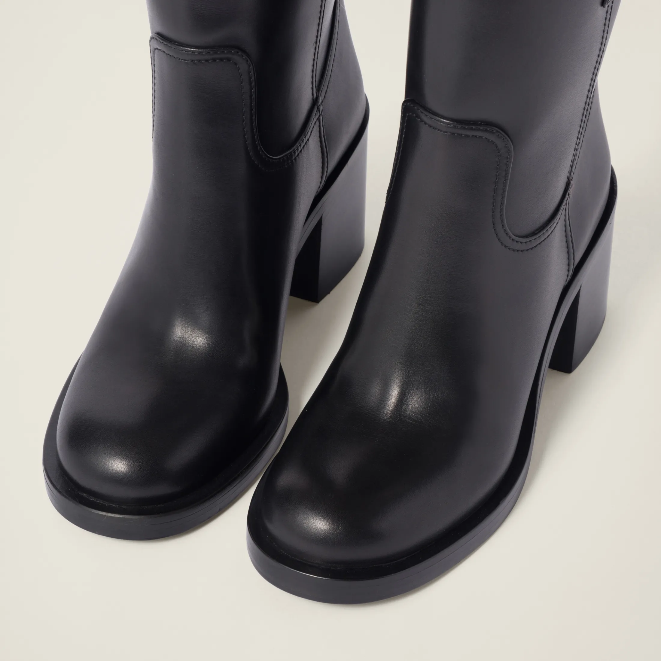 Black Leather Booties | Miu Miu