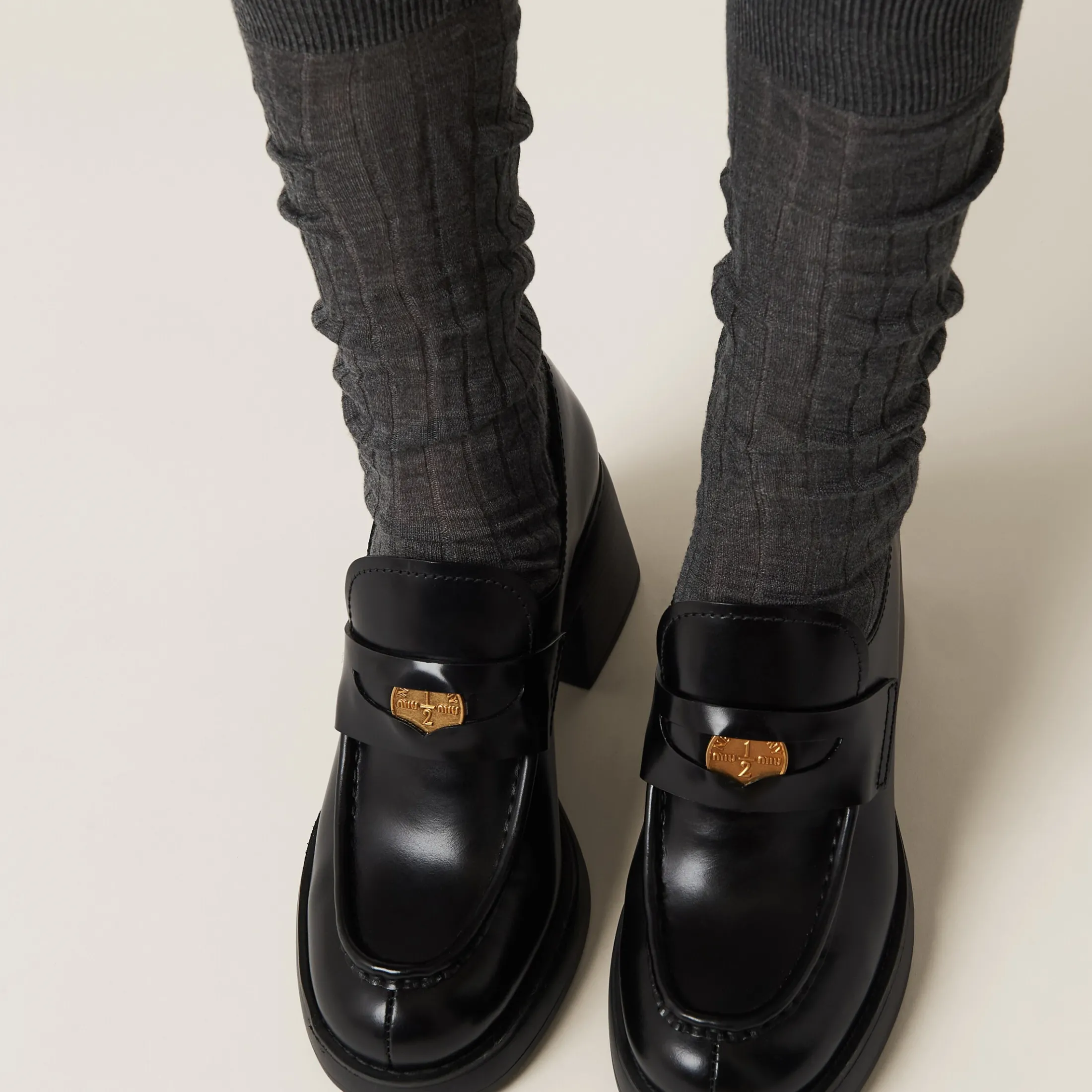 Black Leather Penny Loafers | Miu Miu