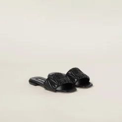 Black Matelassé Nappa Leather Slides | Miu Miu