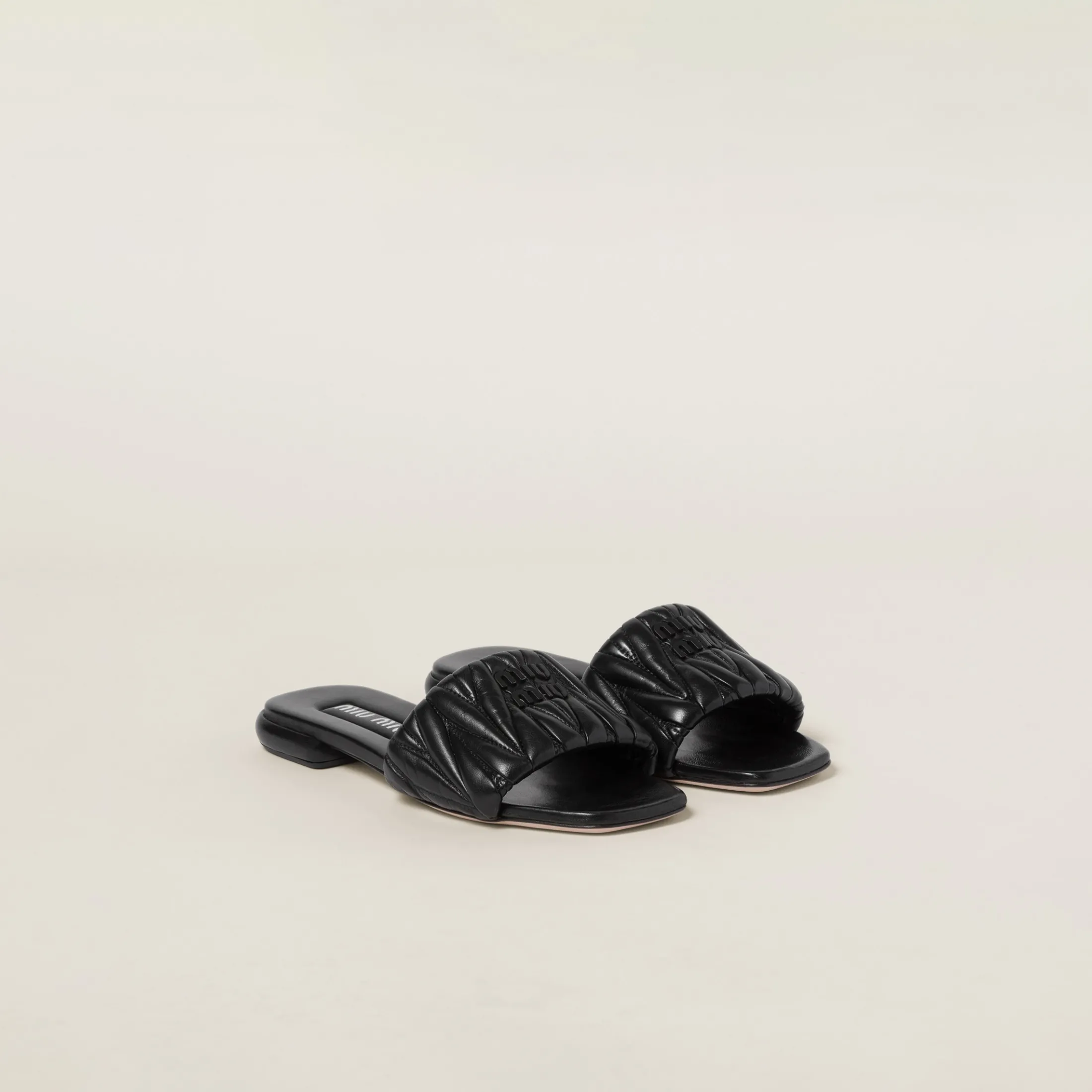 Black Matelassé Nappa Leather Slides | Miu Miu