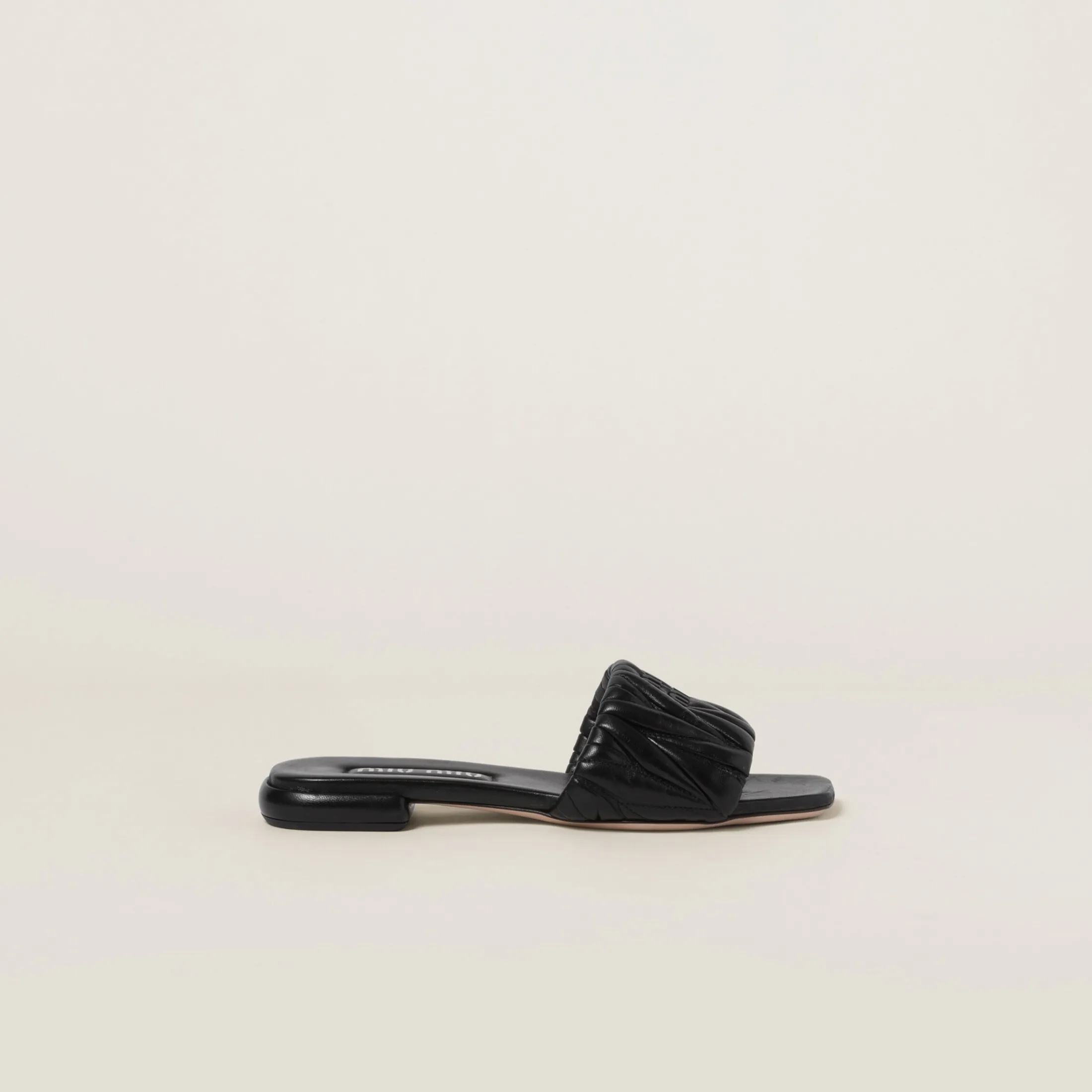 Black Matelassé Nappa Leather Slides | Miu Miu