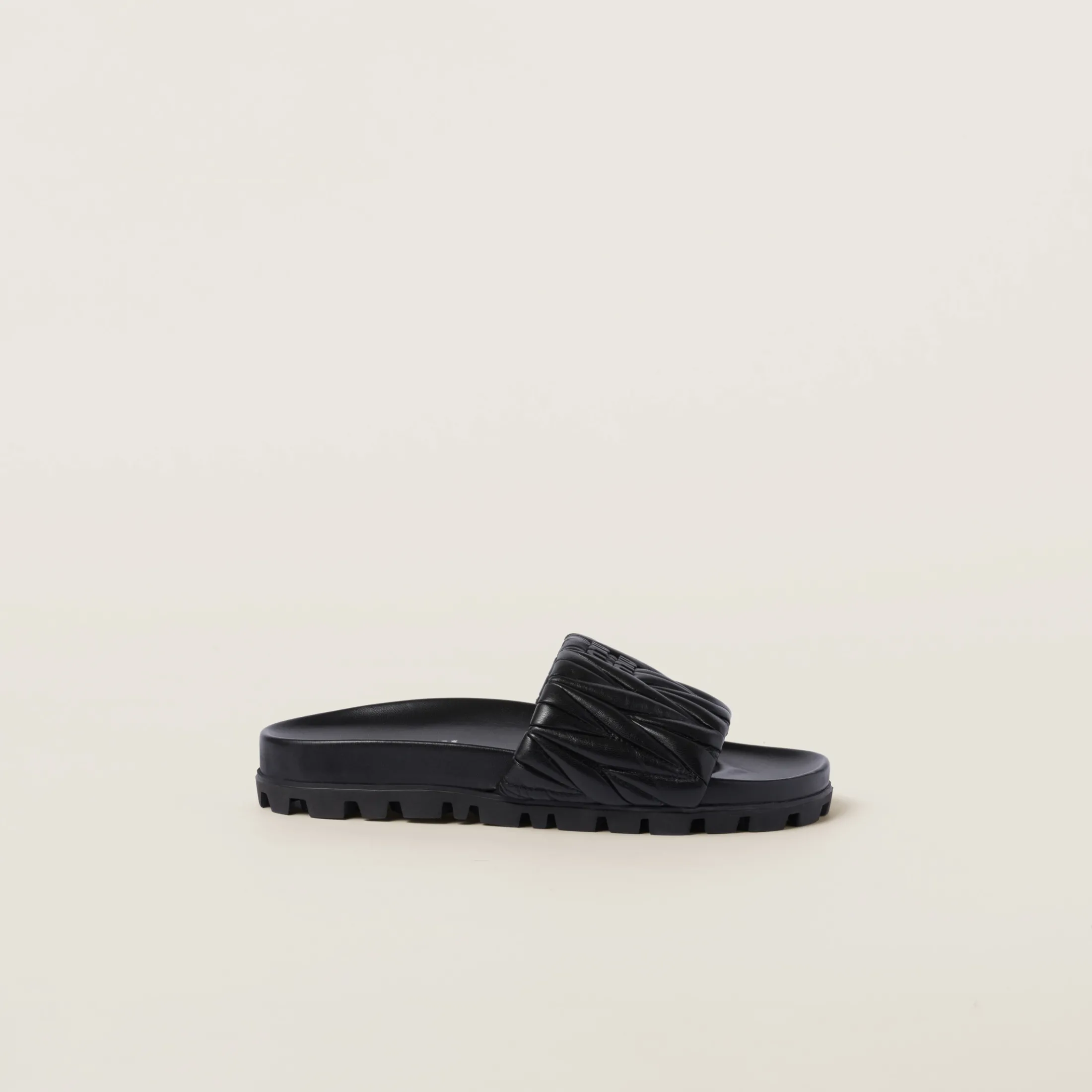 Black Matelassé Nappa Leather Slides | Miu Miu