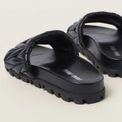 Black Matelassé Nappa Leather Slides | Miu Miu