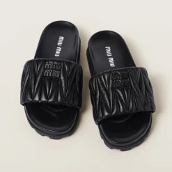 Black Matelassé Nappa Leather Slides | Miu Miu