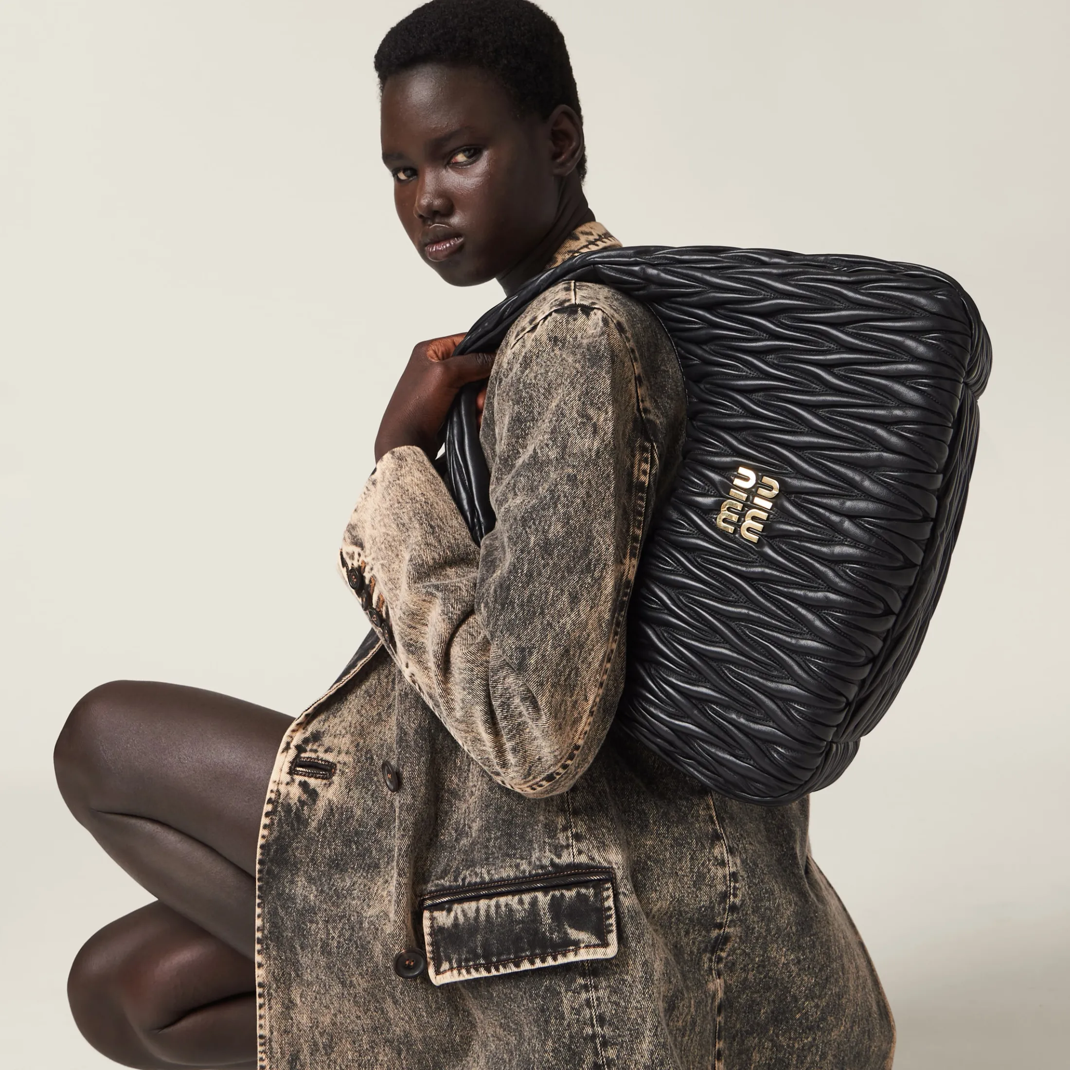 Black Wander Matelassé Nappa Leather Hobo Bag | Miu Miu
