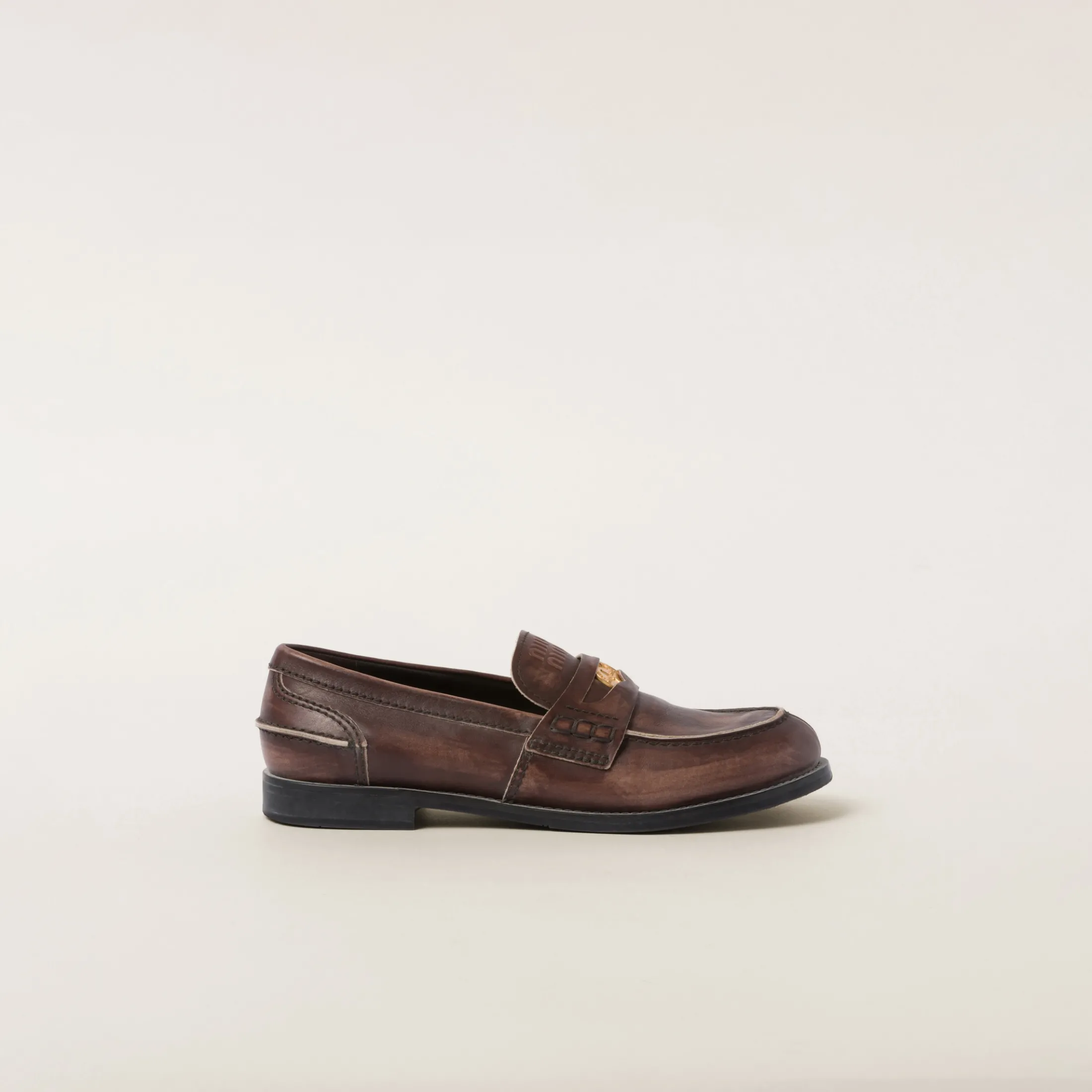 Ebony Vintage-effect Leather Penny Loafers | Miu Miu