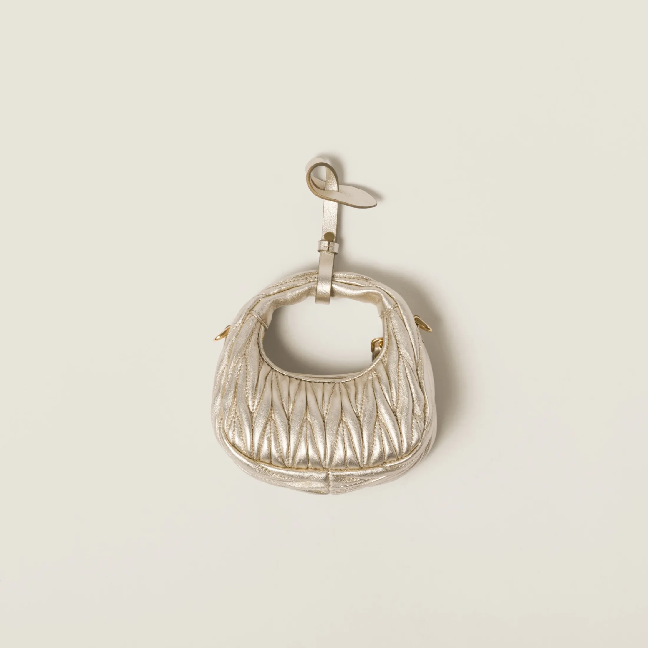Pyrite Wander Matelassé Nappa Leather Micro Hobo Bag | Miu Miu