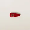 Red Patent Leather Hair Clip | Miu Miu