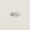 Silver Nappa Leather Hair Clip | Miu Miu