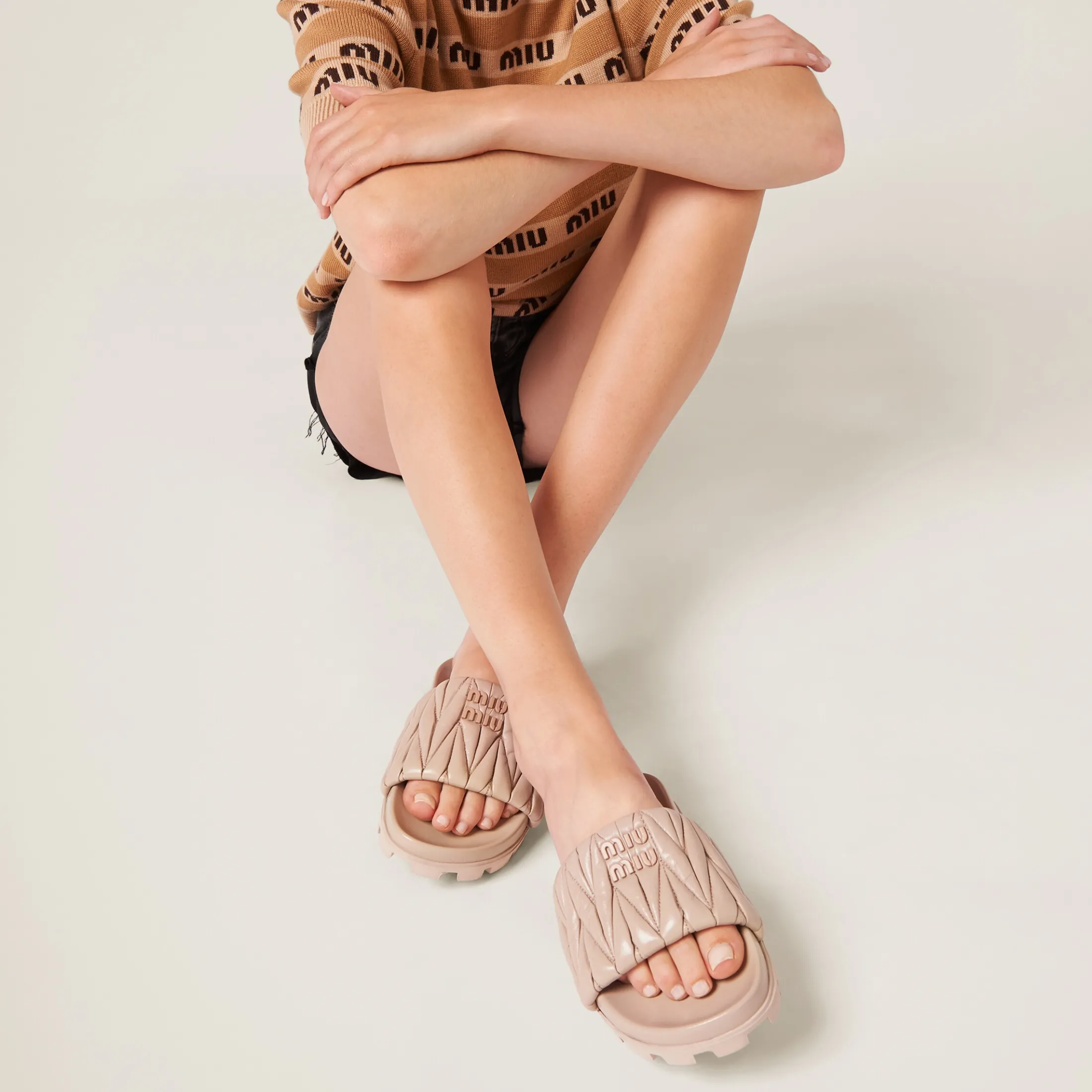 Water Lily Matelassé Nappa Leather Slides | Miu Miu