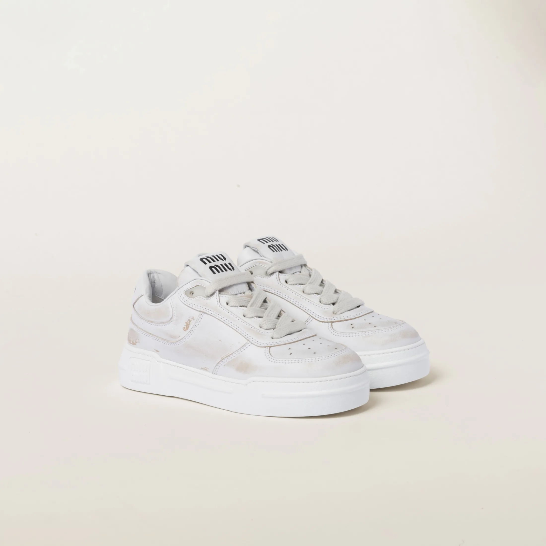 White Bleached Leather Sneakers | Miu Miu