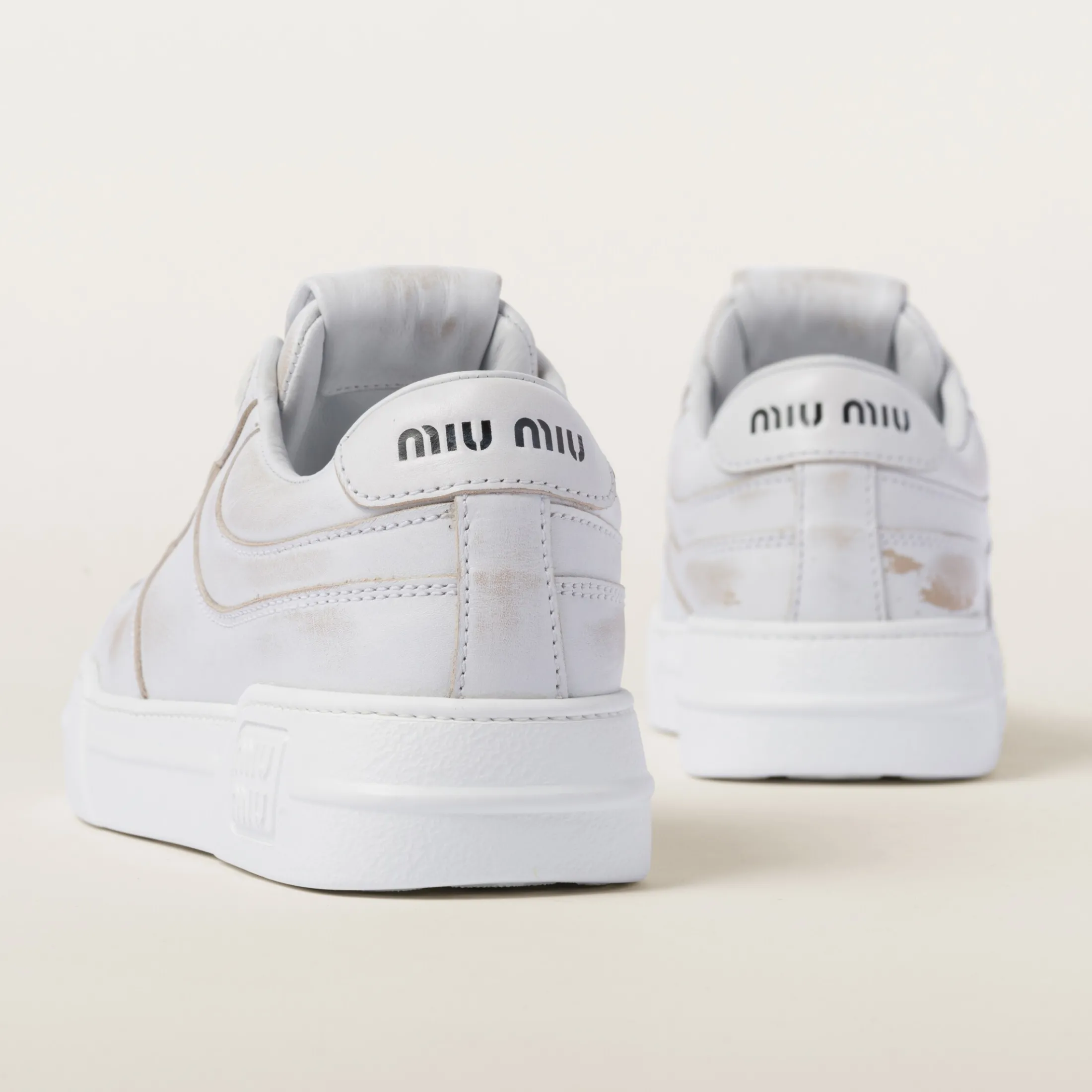 White Bleached Leather Sneakers | Miu Miu