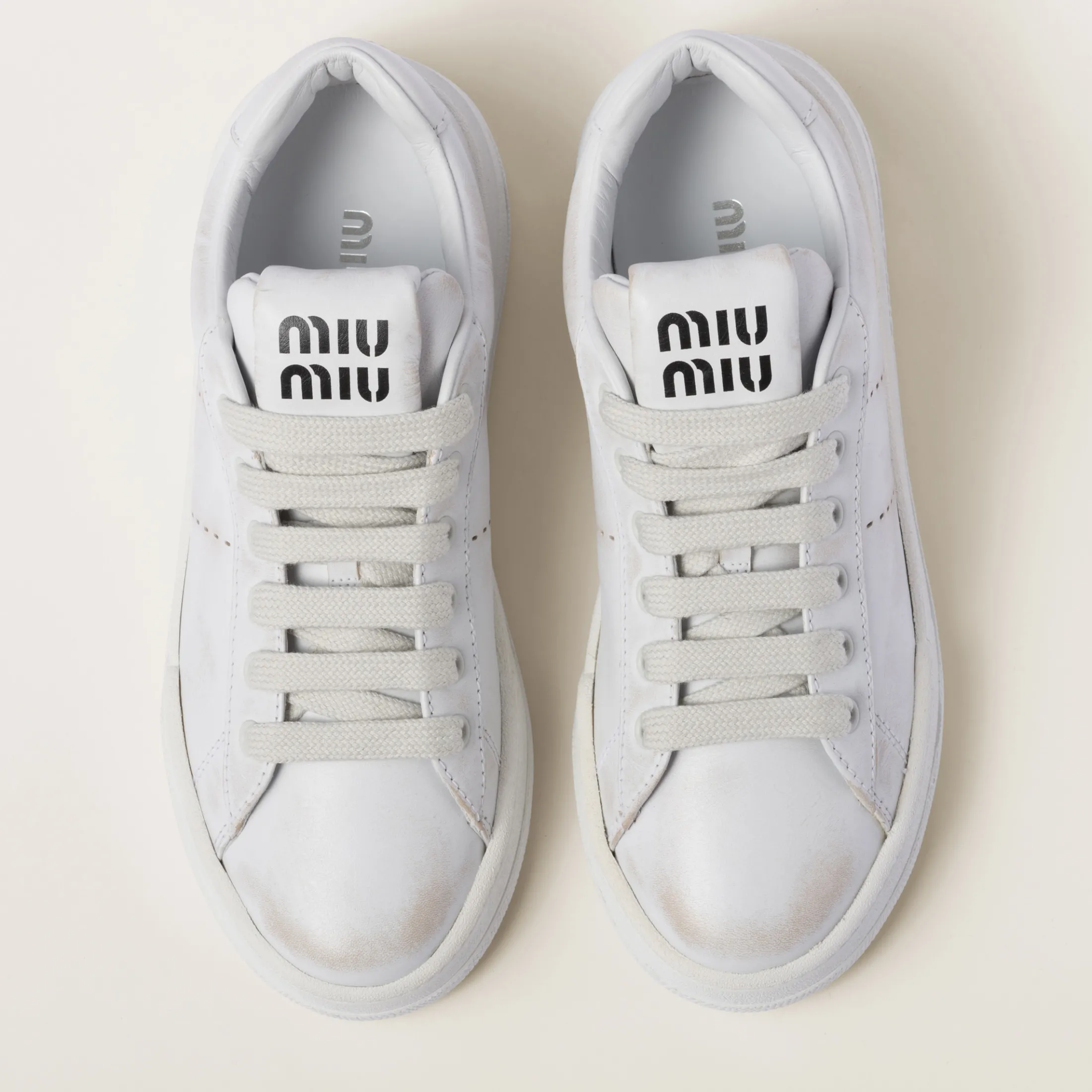 White Bleached Leather Sneakers | Miu Miu